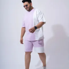 An e-commerce photo of a men's co-ord set. The simple, effective lighting and posing highlight the product's features and fit.
