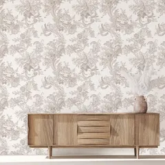 This intricate floral damask pattern in a subtle beige tone brings a touch of Parisian elegance to the room. It serves as a sophisticated backdrop for the wooden sideboard, enhancing its classic appeal.