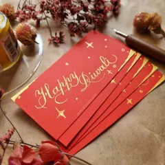 Along with larger projects, I also create smaller items like these custom Diwali gift tags. Written in gold ink on festive red cardstock, they add a lovely handmade touch to any gift.