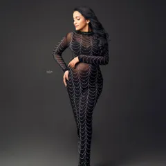 A perfect example of a high-fashion pose in a glamorous, form-fitting gown. I'll teach you how to direct clients to create elegant and confident silhouettes.