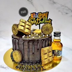 For the ultimate indulgence, I create custom birthday cakes like this double chocolate coffee cake. It features a rich chocolate drip, golden Oreo coins, and can be paired with a miniature bottle of your favorite spirit to elevate the celebration.