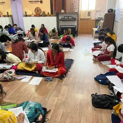 Students of various ages sit together during the theory examination, reflecting our inclusive learning community. We guide everyone through the formal certification process, from young beginners to adult learners.