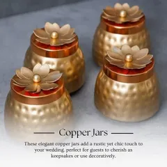 These elegant copper jars with floral lids add a rustic yet chic touch to your wedding. They are perfect for guests to use as decorative keepsakes long after the celebration.