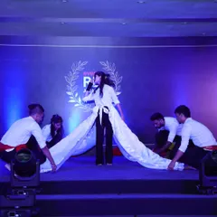 A dramatic moment from our guest showcase for Everest Industries. We use creative props and costuming, like this extended fabric train, to create stunning visual effects and memorable stage pictures.