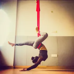 This is the kind of strength and grace you can build with consistent practice. The hammock acts as your partner, supporting you as you challenge your limits and discover what your body is truly capable of. This inverted pose is fantastic for building core and upper body strength.
