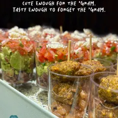 These bites are cute enough for the 'gram, but tasty enough to make you forget your phone. This tray shows my Mexican Layered Cups and Dal Wada Bites ready for an event, proving that party food can be both beautiful and delicious.