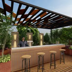 A different perspective of the terrace bar, highlighting the interplay between the architectural pergola, ambient up-lighting on the stone back wall, and the lush greenery that provides a natural enclosure and sense of privacy.
