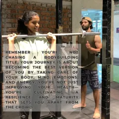 Coaching a client on her squat. My goal is to help you become the best version of yourself by taking care of your body, mind, and energy.