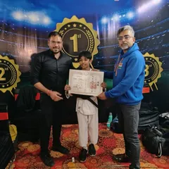 A proud moment for our whole team. Celebrating a new black belt in the dojo is a powerful inspiration for all our younger students who are just starting their own paths.
