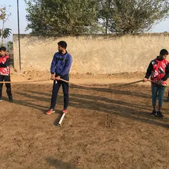Teamwork is also about building strength together. Players participate in a tug-of-war exercise, a great way to build collective power and unity.
