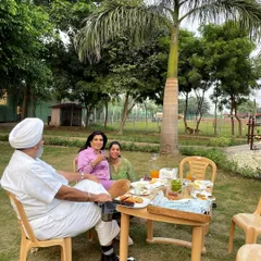 Another angle of this lovely family enjoying their day out. Our spacious layout allows for comfortable seating and plenty of room to spread out, making it ideal for private family gatherings.
