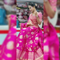 This client looks absolutely radiant in her bright pink Banarasi lehenga. I created a makeup look that enhanced her natural beauty, ensuring it photographed beautifully and felt comfortable throughout her event.