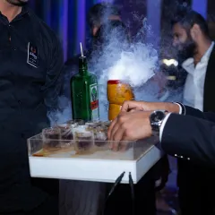 A tray of Jägermeister shots being served with a dramatic smokey effect. This is how I turn a simple round of shots into a memorable spectacle for your guests.