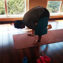 A student working on his Bakasana (Crow Pose) during the workshop. We focus on technique and drills that make these poses feel possible.