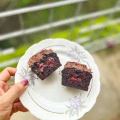 A look inside one of my cupcakes. I love adding surprise fillings, like this sweet and tangy cherry center in a rich chocolate cupcake.