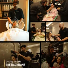 Here is a look at our team in action, providing the final hair and makeup touches for a beautiful bride and groom. We are the backbone of your wedding glam, ensuring every detail is perfect.