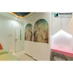 A closer look at the custom wardrobe in the kids' room. The doors feature beautiful arched panels with artistic floral prints, adding a touch of whimsy and elegance to the space.
