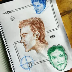 A page from my sketchbook filled with practice sketches of faces from different angles. This is how I work on understanding perspective and structure, using the Loomis method as a guide.