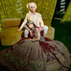 A royal portrait of the bride and groom. The makeup looks regal and polished in this beautifully styled shot, highlighting the bride's elegance.