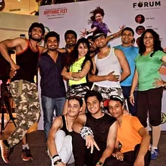 The whole crew posing after a successful Zumba session at the Forum mall. We love bringing our energy to public spaces and events.