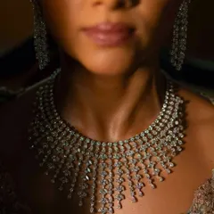 A close-up of a bespoke bridal masterpiece, where every diamond is meticulously set to create a river of light. This 69-carat diamond necklace showcases the pinnacle of our handcrafted bridal designs, created to feel as magnificent as it looks and move with the grace of the bride who wears it.
