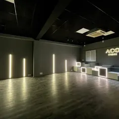 This is one of our main dance halls at ACO Studios. It's a spacious, well-lit area with a modern design, providing ample room for everything from solo practice to large group Sangeet rehearsals.
