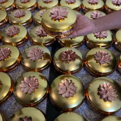 A closer look at the stunning copper and gold lotus boxes that were part of the Arangetram hampers. These are a perfect example of traditional, elegant gifting.