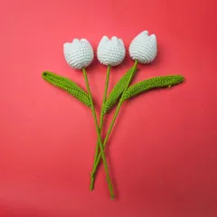 These beautiful white crochet tulips are perfect for adding an elegant and handmade touch to any gift hamper. They are a keepsake that will last forever.