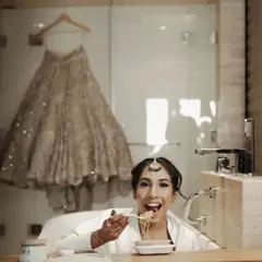 A bride's gotta eat! This fun and candid shot of the bride enjoying some noodles in the bathtub before getting fully dressed is a reminder that we capture the real, unstaged moments too.