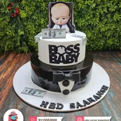 The center of attention for a Boss Baby themed party. This two-tier cake features the iconic character, a tuxedo design, and even edible money, all made by my partners at Cake Corner.