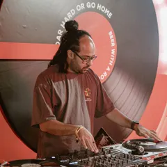 It's all in the details. Here I am deep in the mix during a 'City Goes Wax' vinyl set. This is for the analog heads who appreciate the warm sound and hands-on craft of a true vinyl DJ experience.