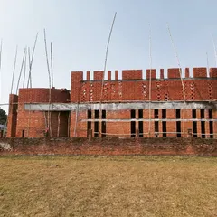During its construction, the anticipation for Ashadeep School was palpable. The rising brick walls, with their playful crenellations, stood as a promise to the children of the village who eagerly watched their new school take shape.