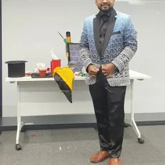 Posed and ready for a corporate event. I provide professional, polished entertainment that is perfect for company parties, client appreciation events, and product launches.