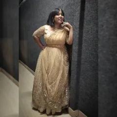 Posing in a lovely golden lehenga for a show. I work with talented designers to create unique looks for my television appearances.