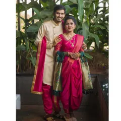 A full-length portrait displaying the grace of a traditional Nauwari saree. This pose captures the elegance and cultural pride of the couple's chosen pre-wedding theme.