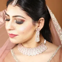 A detailed shot of the Diwali look, focusing on the intricate design of the necklace and earrings. It’s a sophisticated set that complements both modern and traditional outfits.