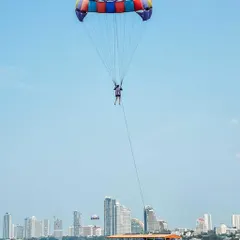 Get a new perspective on Pattaya's coastline by parasailing high above the water. It's an exhilarating experience that combines stunning views with a serious adrenaline rush, and we can book it for you.