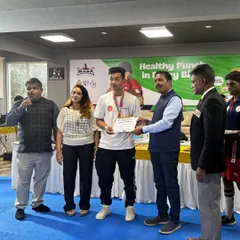 Another one of our boxers on the podium, receiving his award at the championship. We train to compete.