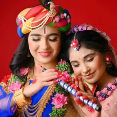 The eternal love of Radha and Krishna, captured in a moment of divine connection. This conceptual shoot for Janmashtami celebrates their sacred bond through music and devotion.