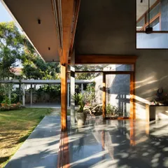 Morning light streams across the verandah, casting long shadows and highlighting the texture of the polished floor and wooden frames. We carefully orient our buildings to capture the beauty of light at different times of day.
