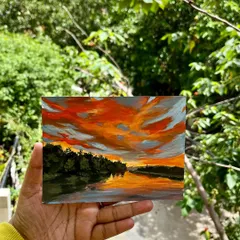 A vibrant 6x8 inch acrylic painting capturing the magic of a sundown over the water. This limited edition piece is perfect for landscape lovers.