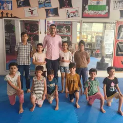 Another group photo, showing the mix of boys and girls who train together at the Gurukul.
