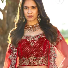 The blouse detail of this rental bridal lehenga features beautiful zardozi and stonework, paired with a matching choker necklace from my accessories collection to complete the look.