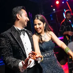 Dancing the night away. The bride's gown was not only stunning but also comfortable enough to let her enjoy every moment on the dance floor, a key consideration in our styling process.