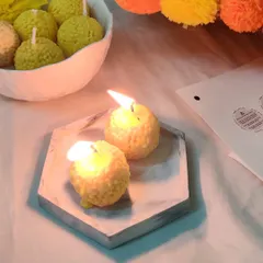 Adding a sweet, traditional touch to your festivities is easy with my motichoor ladoo candles. They look just like the real thing and fill the room with a beautiful, warm light.