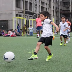 Perfecting shooting form is crucial. This young athlete practices his striking technique, focusing on body position and follow-through to generate power and accuracy.