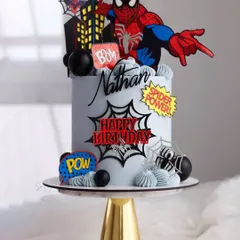 Your friendly neighborhood Spider-Man, in cake form! This design features a city skyline, comic book-style "POW!" toppers, and a dynamic Spidey figure, perfect for a superhero fan's birthday.
