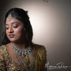 A close-up of Pooja's reception makeup. We created a soft, shimmery eye look and a glossy nude lip, a perfect combination for an elegant evening event.