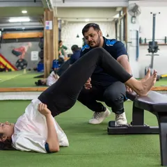 A key part of my rehab process is re-training fundamental movement patterns like the hip hinge. This ensures the glutes and hamstrings are firing correctly to protect the lower back and knees.
