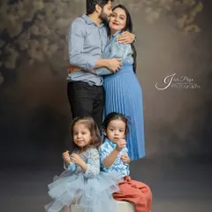 A family portrait is more than just a photo; it's a memory of love and connection. I focus on capturing those unscripted, warm interactions that truly define your family's bond in my comfortable studio setting.